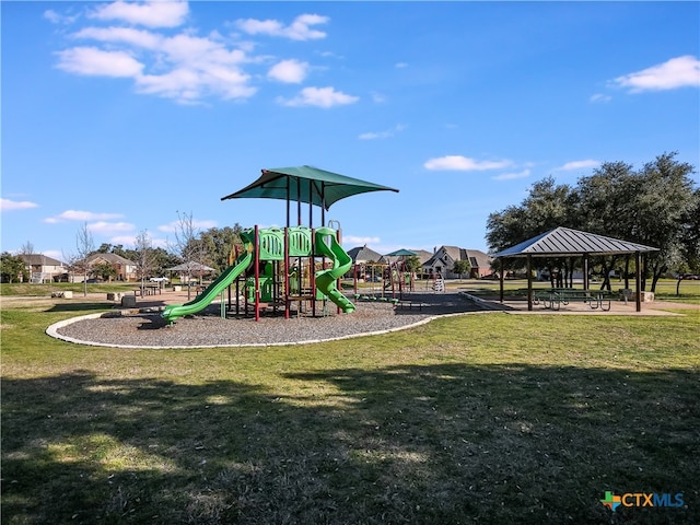 communal playground with a gazebo and a yard