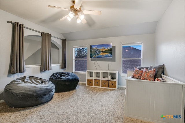 carpeted bedroom with baseboards, ceiling fan, and lofted ceiling