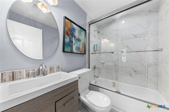 313 E Texas Ave, Killeen, TX 76541 - bathroom with toilet, vanity, and shower / bath combination with glass door