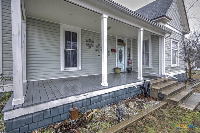 entrance to property with a porch