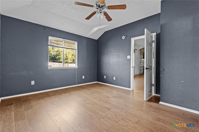 5105 Parkwood Dr, Killeen, TX 76542 - unfurnished room with wood finished floors, a ceiling fan, and vaulted ceiling
