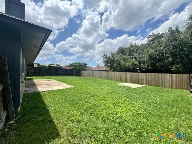 5105 Parkwood Dr, Killeen, TX 76542 - fenced backyard with a patio