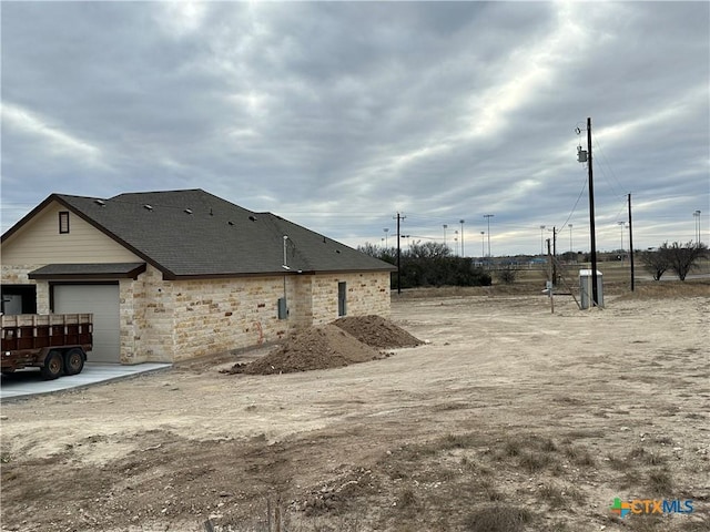 exterior space with a garage