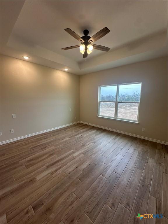 unfurnished dining area with light hardwood / wood-style flooring and an inviting chandelier