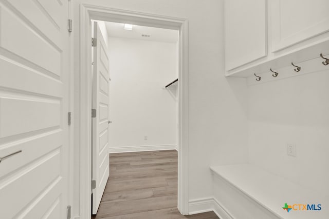 mudroom featuring light wood-type flooring