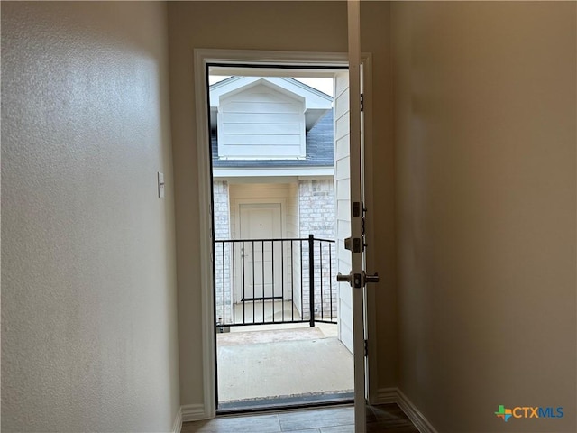 5106 Rose Petal Ct, Killeen, TX 76542 - entryway featuring a textured wall and wood finished floors