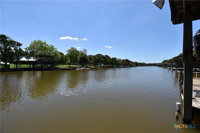 water view with a gazebo and a boat dock