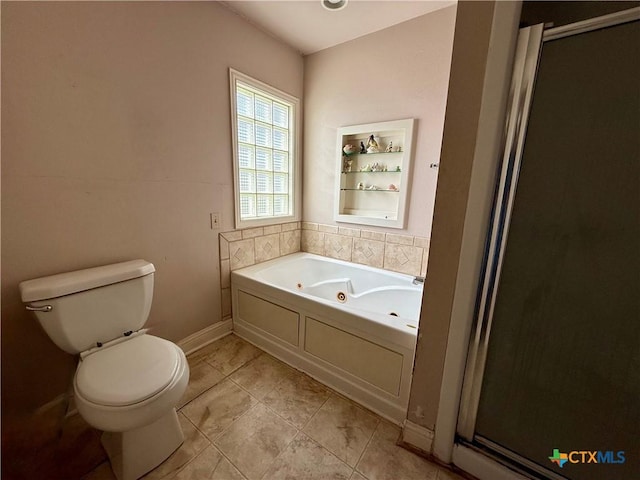 202 S Virginia St, Port Lavaca, TX 77979 - bathroom featuring a tub with jets and a stall shower