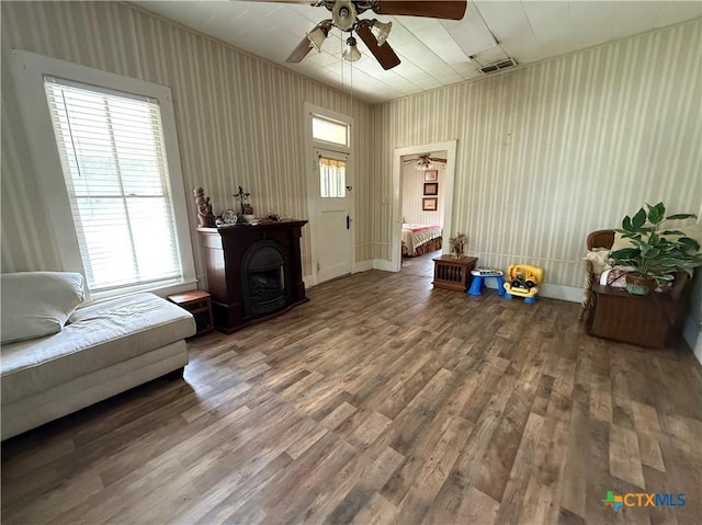 202 S Virginia St, Port Lavaca, TX 77979 - living area with ceiling fan and wood finished floors