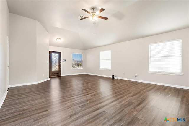 unfurnished living room with ceiling fan, baseboards, dark wood-style floors, and vaulted ceiling