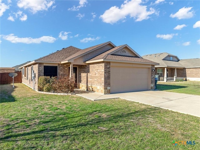 ranch-style home featuring brick siding, a front lawn, concrete driveway, roof with shingles, and an attached garage