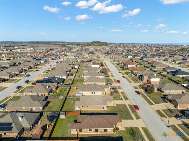 birds eye view of property with a residential view