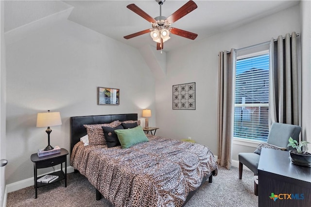 bedroom featuring carpet, vaulted ceiling, and ceiling fan