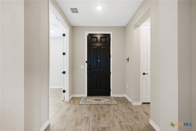 foyer featuring light hardwood / wood-style flooring