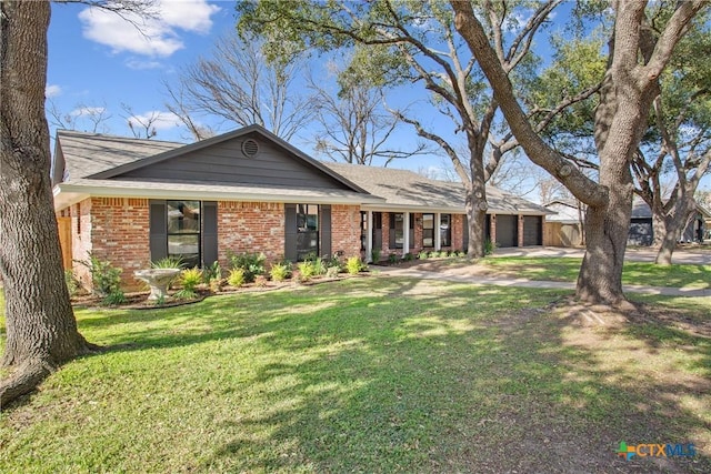 ranch-style house with a front lawn and a garage