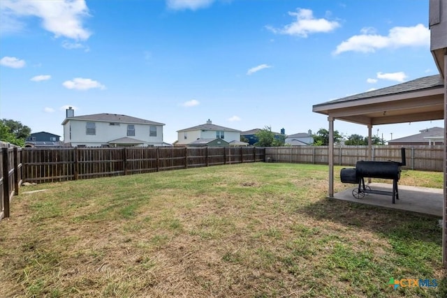4203 Rambling Range Dr, Killeen, TX 76549 - fenced backyard with a patio