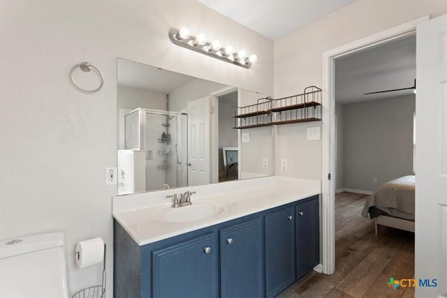 4203 Rambling Range Dr, Killeen, TX 76549 - ensuite bathroom featuring vanity, a shower stall, and wood finished floors