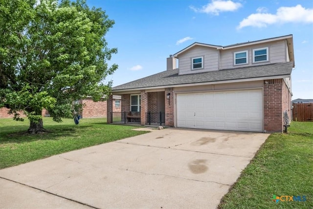 4203 Rambling Range Dr, Killeen, TX 76549 - traditional-style home with brick siding, concrete driveway, a garage, and roof with shingles
