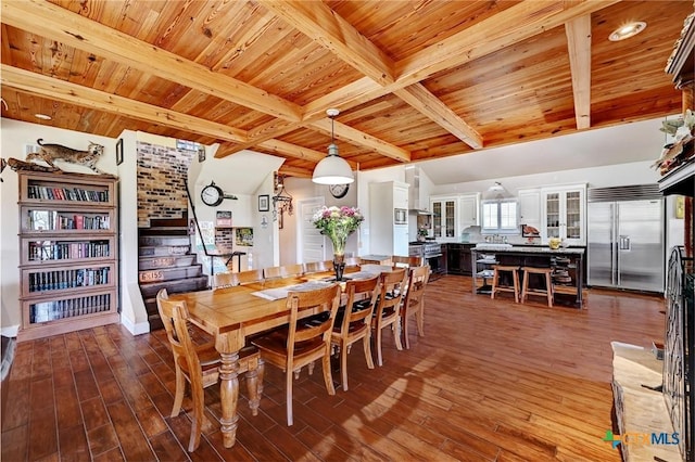 dining space featuring stairway, wood finished floors, wood ceiling, and beamed ceiling