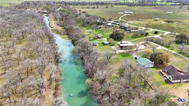 aerial view with a water view and a rural view