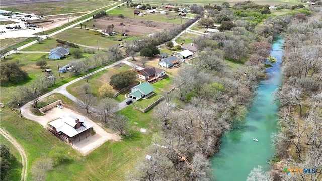bird's eye view featuring a water view and a rural view