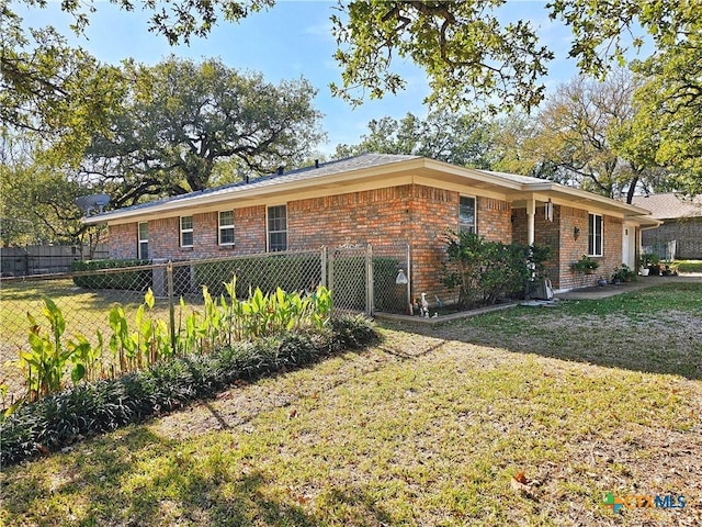 exterior space with a yard