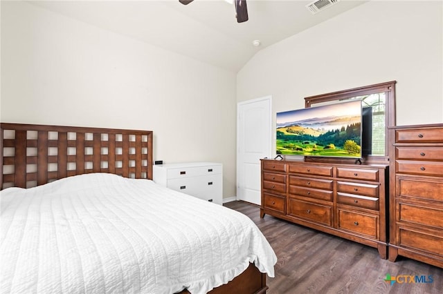 bedroom with visible vents, a ceiling fan, lofted ceiling, and dark wood-style floors