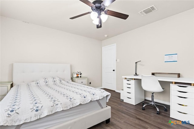 bedroom with baseboards, a ceiling fan, dark wood-style flooring, and visible vents
