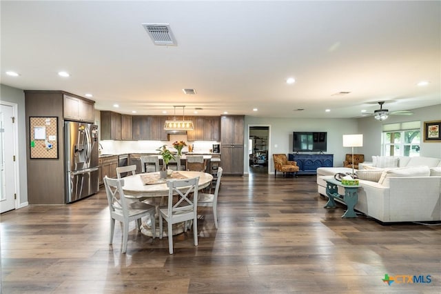 dining area with visible vents, recessed lighting, a ceiling fan, and dark wood-style floors