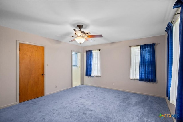 406 Wagner Way, Victoria, TX 77904 - unfurnished bedroom featuring baseboards, ceiling fan, and carpet