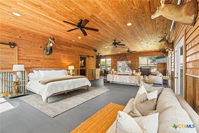 bedroom featuring recessed lighting, wooden walls, and wood ceiling