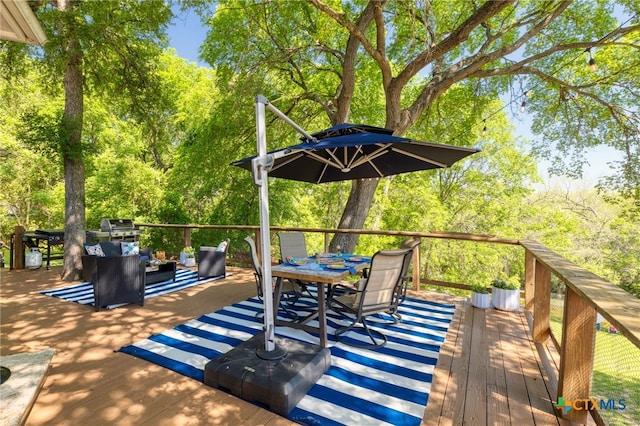wooden terrace featuring an outdoor living space and outdoor dining space