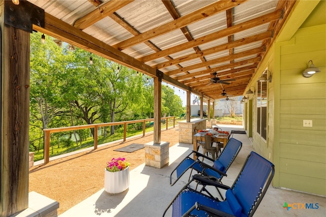 view of patio / terrace featuring a ceiling fan