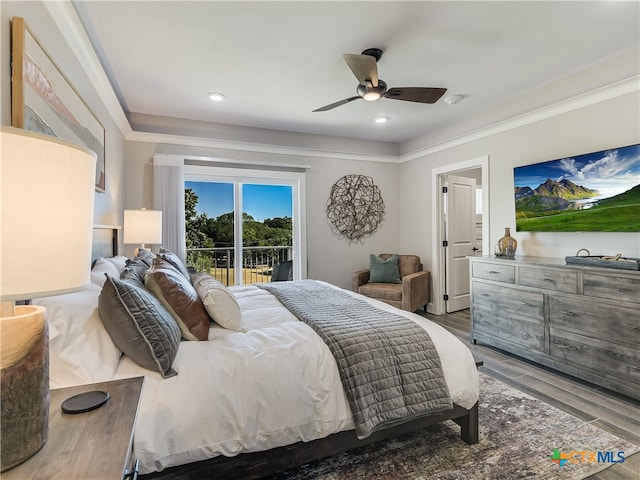 bedroom with crown molding, hardwood / wood-style floors, ceiling fan, and access to exterior