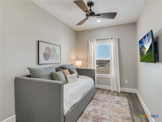 interior space with hardwood / wood-style floors and ceiling fan