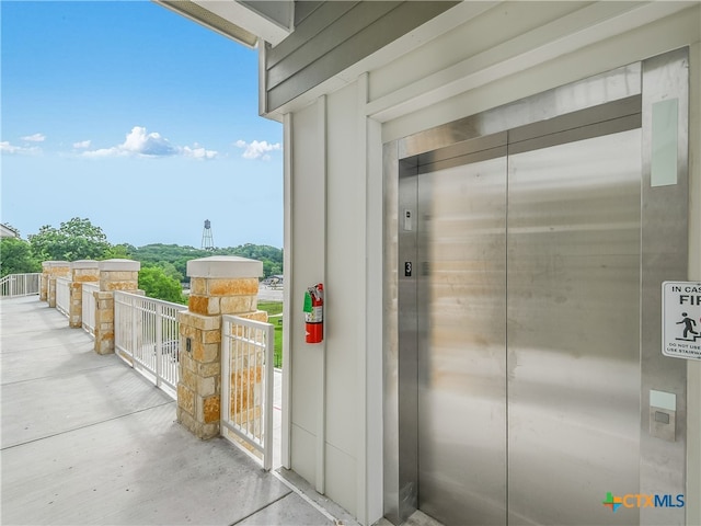 view of exterior entry featuring elevator