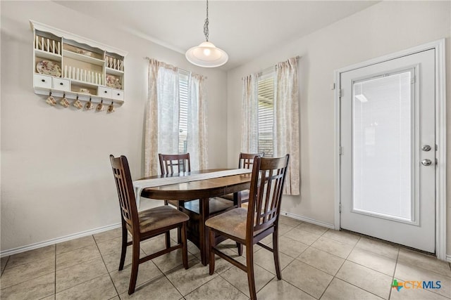 3610 Parkmill Dr, Killeen, TX 76542 - dining space featuring baseboards and light tile patterned floors