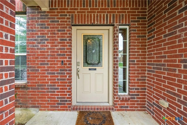 3610 Parkmill Dr, Killeen, TX 76542 - doorway to property featuring brick siding