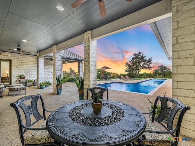 exterior space featuring ceiling fan and a patio area