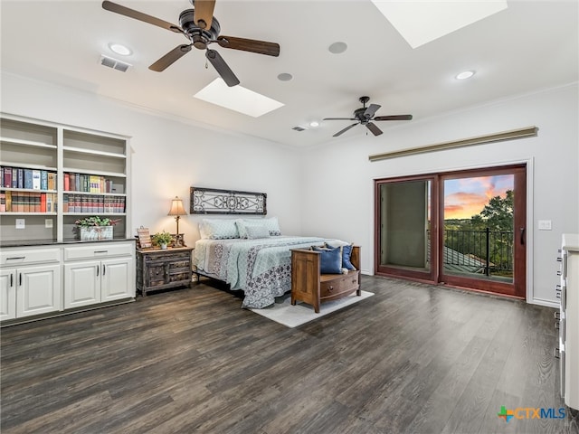 bedroom with crown molding, access to exterior, dark wood-type flooring, a skylight, and ceiling fan