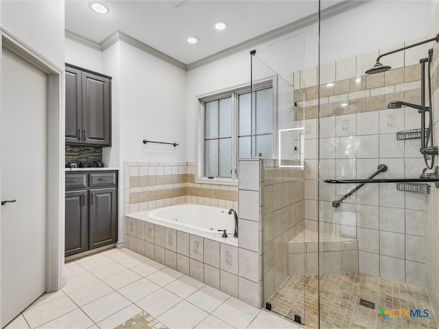 bathroom featuring independent shower and bath, vanity, tile patterned floors, and crown molding