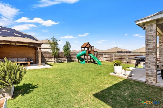 view of yard featuring a playground, a patio, an outdoor hangout area, and a gazebo