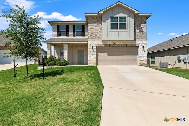 view of front of home with stone siding, board and batten siding, concrete driveway, a garage, and a front yard