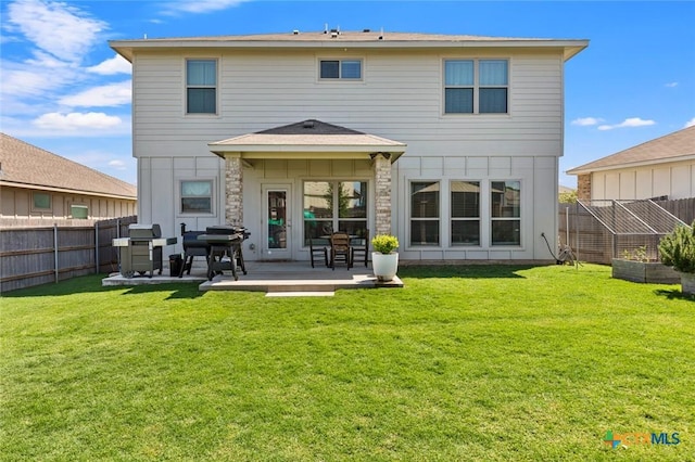 rear view of house featuring a patio