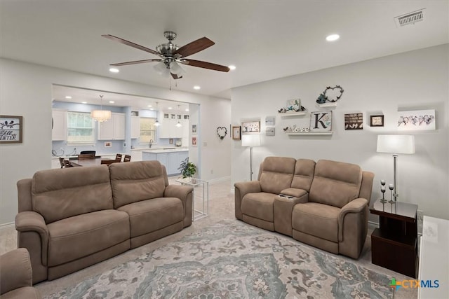 living room with ceiling fan