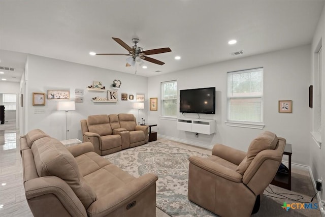 living room featuring ceiling fan