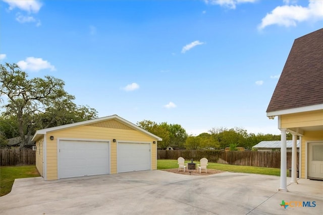 garage featuring a yard