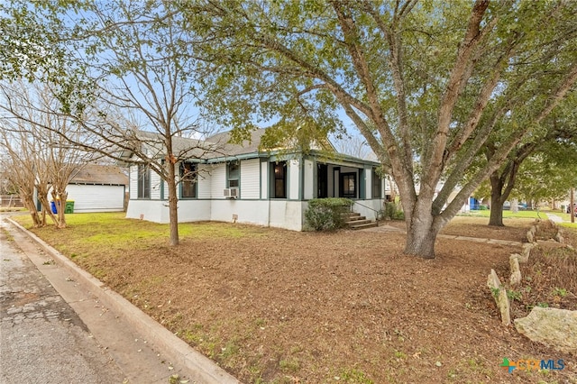 view of front of property featuring cooling unit