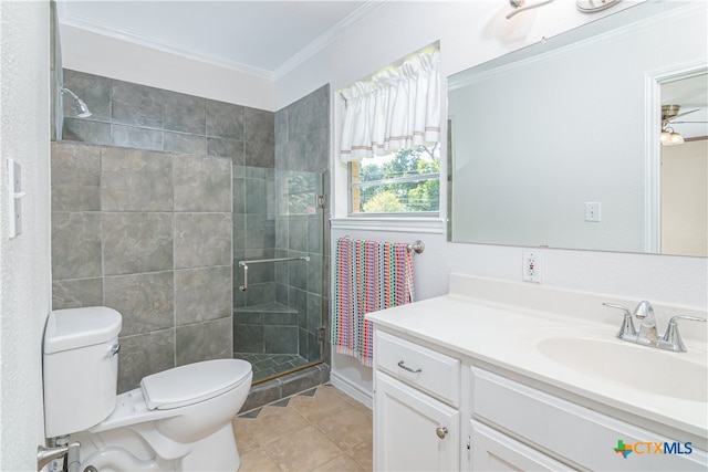 bathroom with crown molding, walk in shower, vanity, tile patterned flooring, and toilet