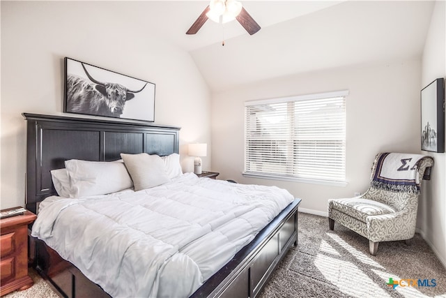 carpeted bedroom with lofted ceiling and ceiling fan